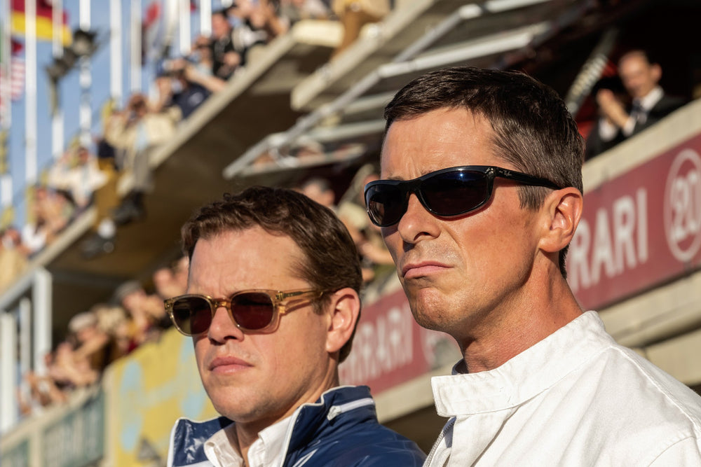 Matt Damon and Christian Bale wearing sunglasses in Ford v. Ferrari