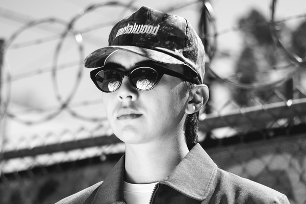 Cole Young wearing Garrett Leight California Optical Juvee Sun