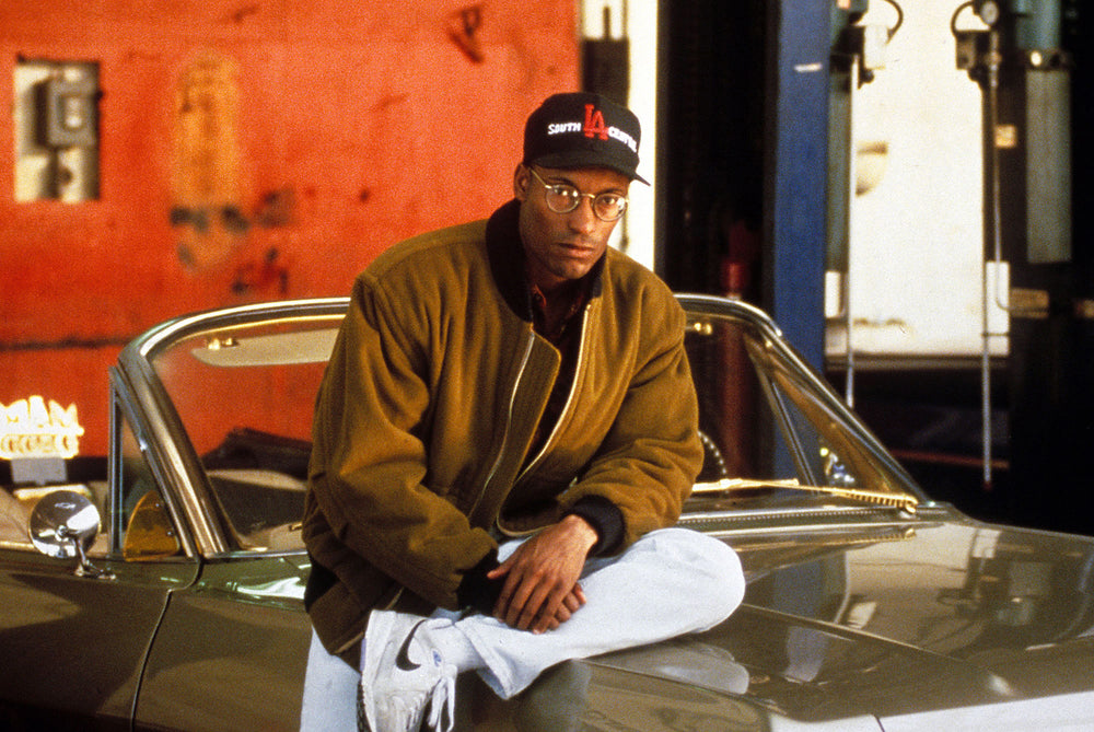 Photo of John Singleton wearing glasses