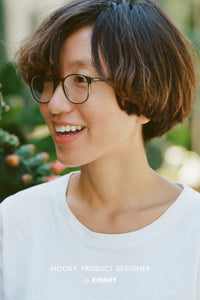 Mooky wears Garrett Leight California Optical Kinney Eyeglasses